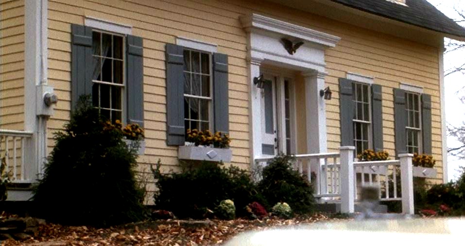 close up of windows with gray shutters baby boom movie house