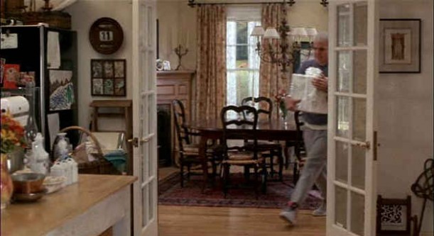 Steve Martin walking through dining room