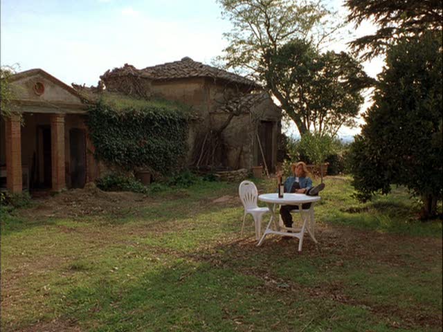 A chair in a grassy yard