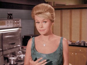 Elizabeth Montgomery standing in a kitchen