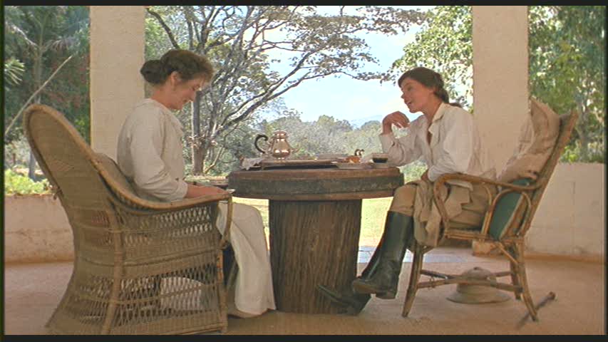 Karen and Beryl Markham sitting at table together in Out of Africa