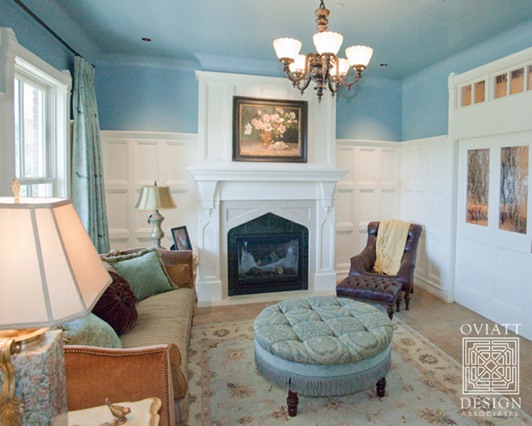 A living room filled with furniture and a fire place