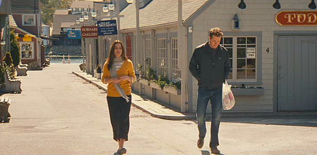 Sandra Bullock and Ryan Reynolds walking together through Rockport