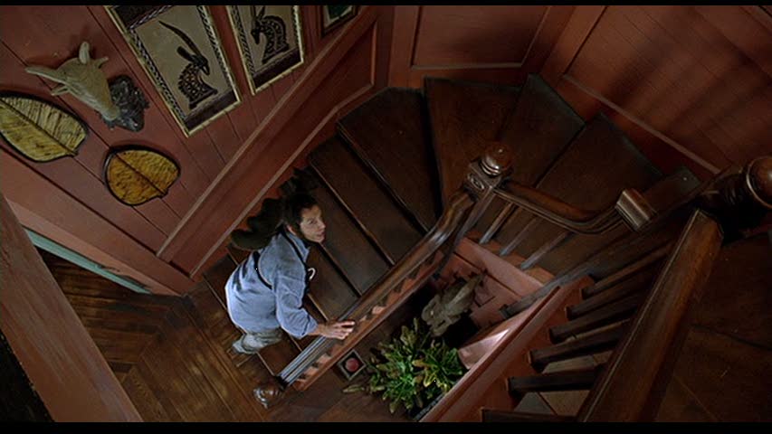 Ben Stiller climbing staircase in Meet the Fockers