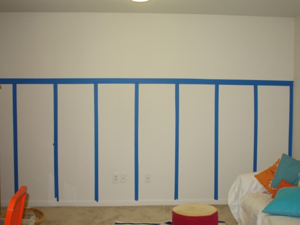 planning where board and batten will go with blue painter\'s tape