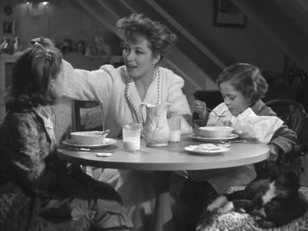 Greer Garson and her character\'s daughters in the attic playroom