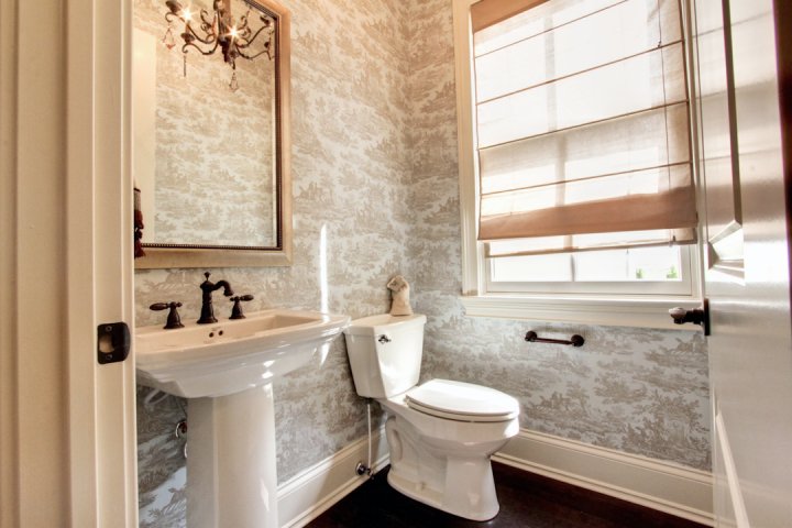 powder room with wallpaper