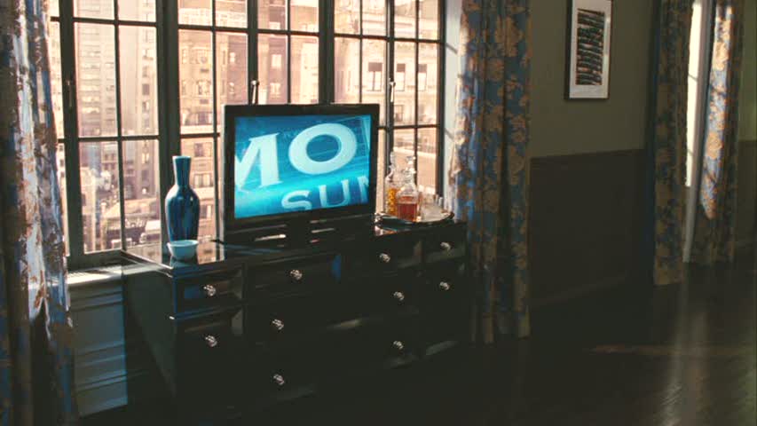 flat screen TV on dresser