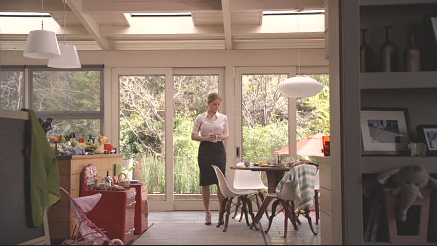 Julia standing in kitchen on Parenthood