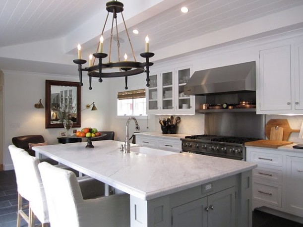 white kitchen with marble island