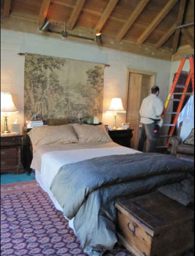 decorating the bedroom before filming a scene