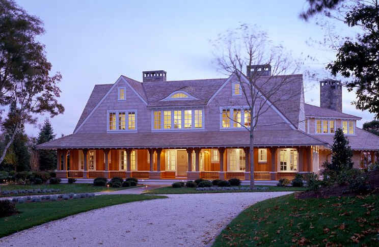 front exterior of Champlain\'s Bluff house with front porch and shingle siding