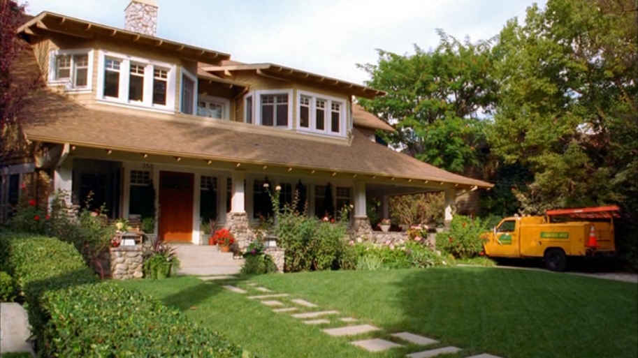 Good Luck Charlie house with bay windows and front porch