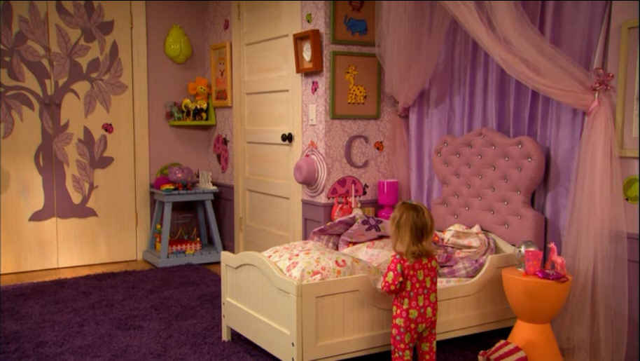 girl\'s bedroom with toddler bed