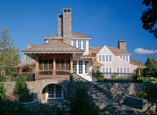 side exterior view of house with screened porch