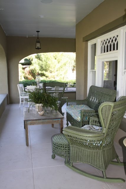 wicker furniture on front porch