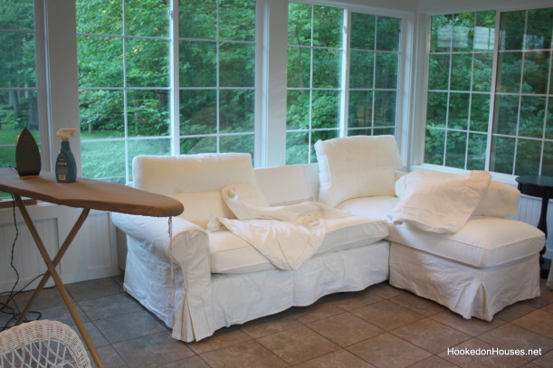 ironing the slipcovers for the sofa