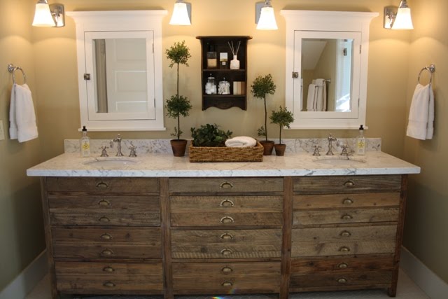 bathroom with new vanity and mirrors