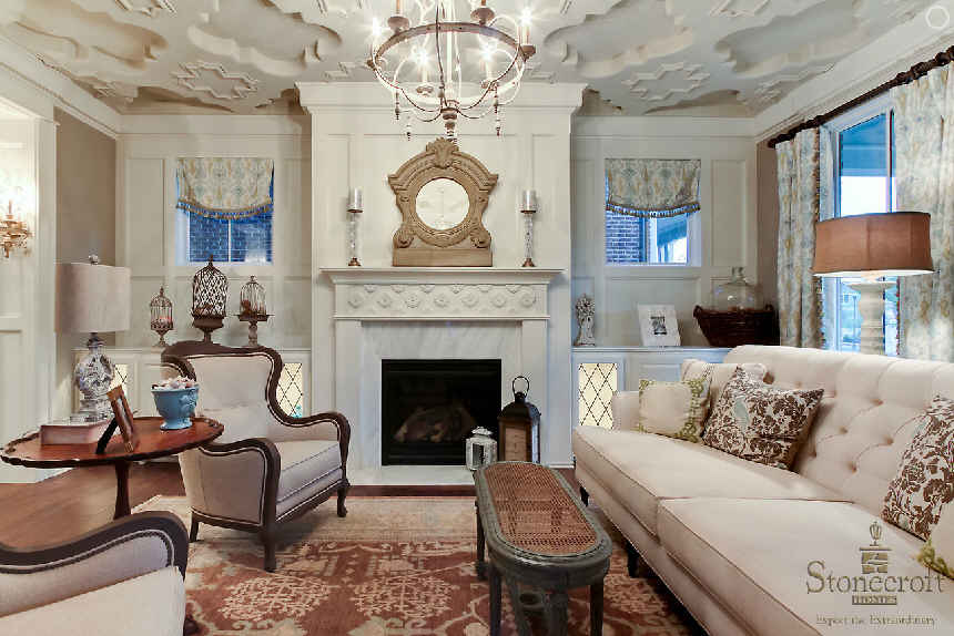 A living room filled with furniture and a fireplace