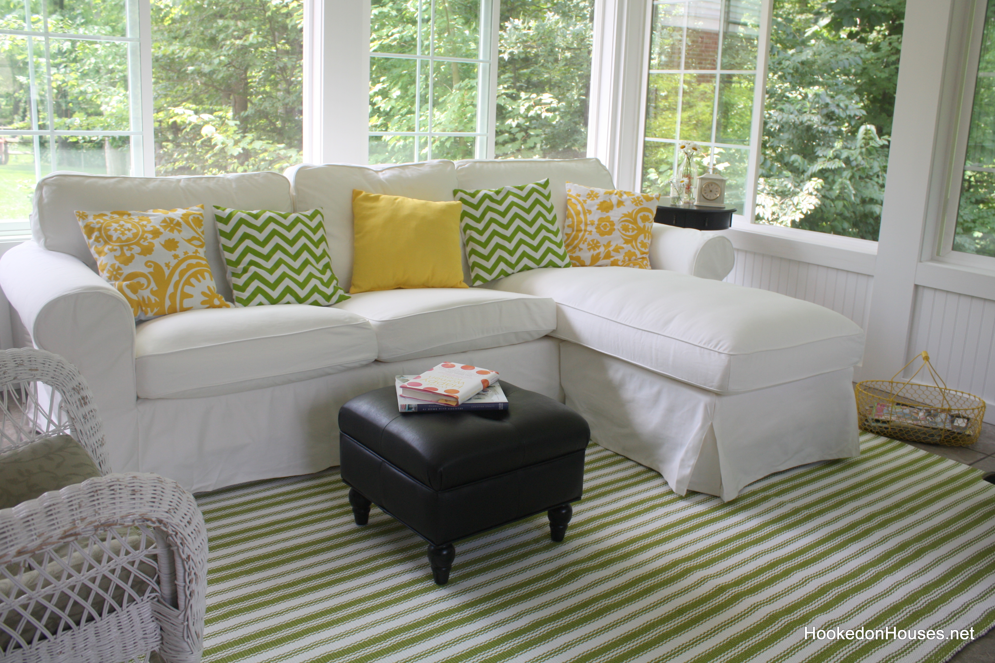new sofa pillows and rug in the sunroom Hooked on Houses