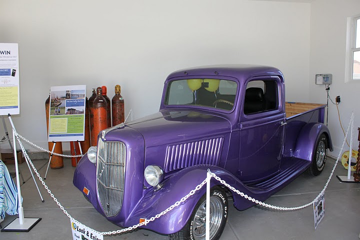 Carl\'s purple vintage pickup truck in garage 