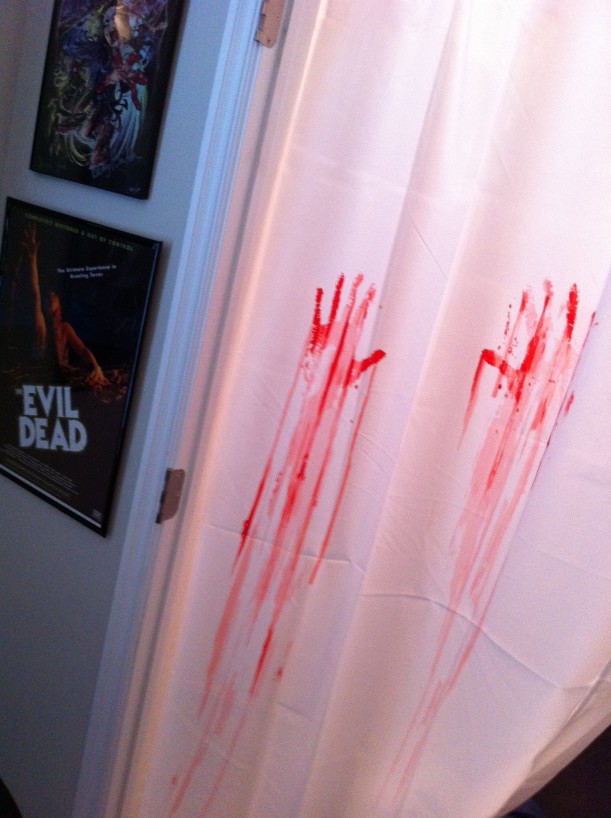 bloody handprints on shower curtain