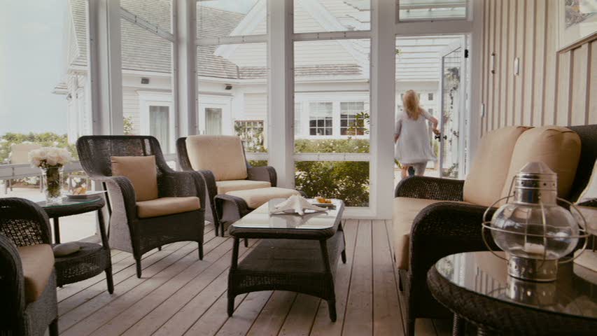 screened porch behind house