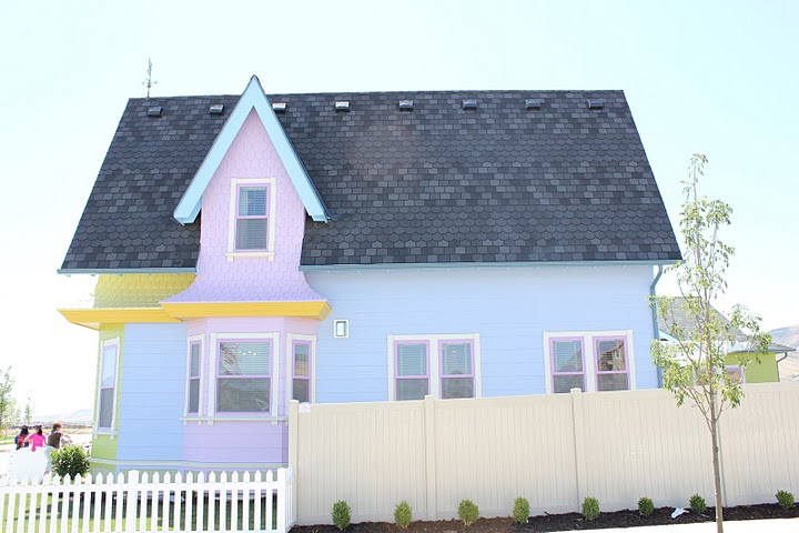 side exterior view of Up house replica in Utah with blue and purple siding