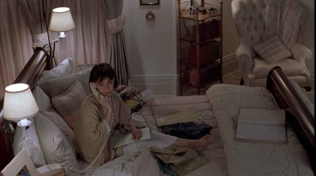 Sally Field talking on phone in bed