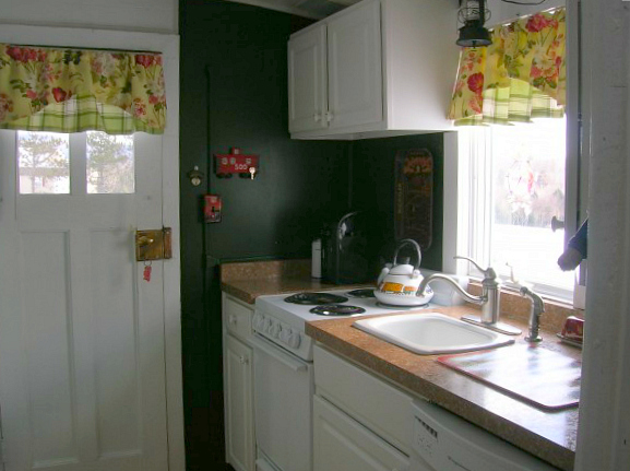 a train car turned into a tiny house-kitchen