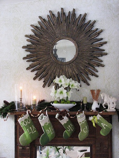 mantel with green stockings and mirror