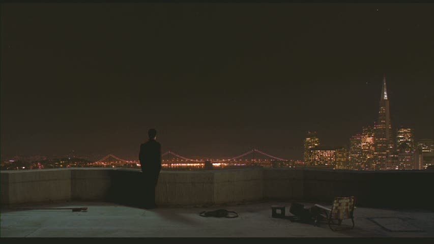 view of bridge from rooftop at night