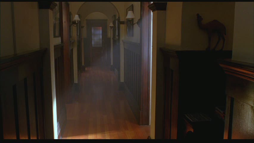 long apartment hallway with original woodwork