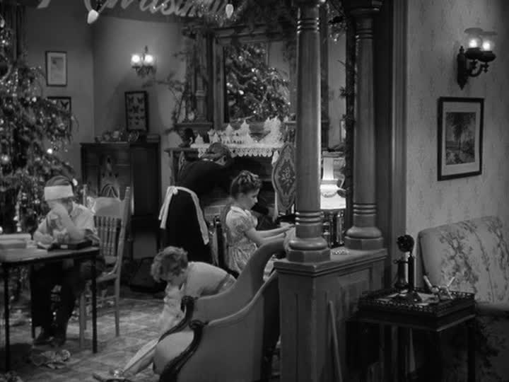 living room decorated for Christmas in It\'s a Wonderful Life