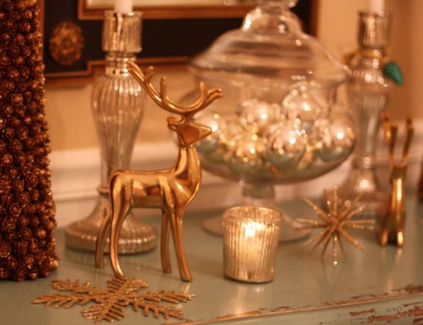 brass reindeer on table