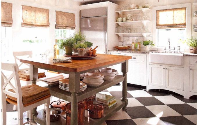 A kitchen with black and white checkerboard tile