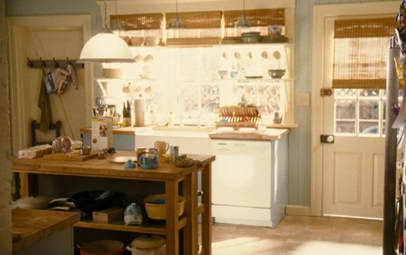 A kitchen with a sink and a window