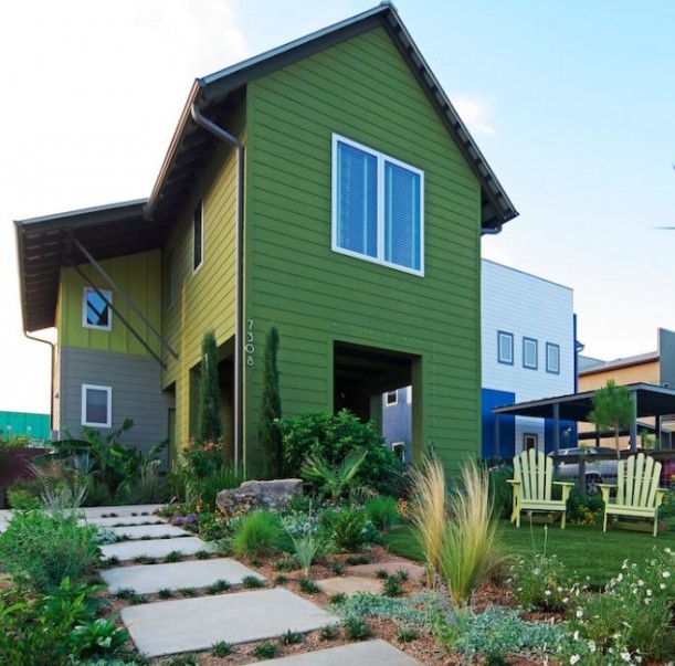 front exterior of Roger Hazard\'s modern farmhouse with green siding