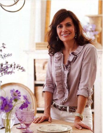 Donna Talley standing in front of a table