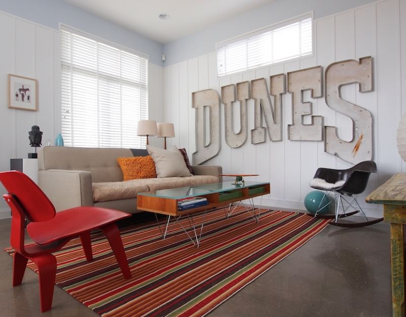 A living room with the word Dunes on the wall