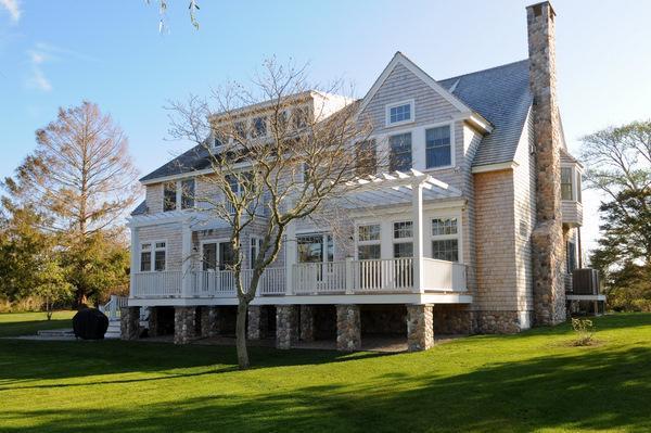 A large lawn in front of a house