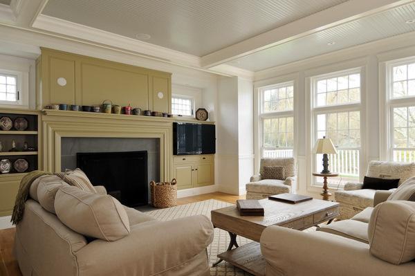 Replica of Grey Gardens house in Cape Cod-green fireplace