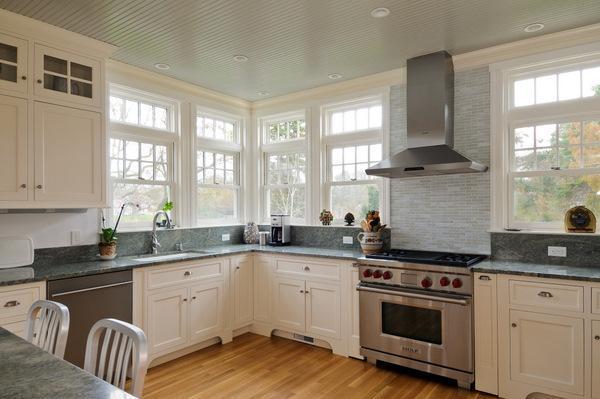 A kitchen with a sink and a window