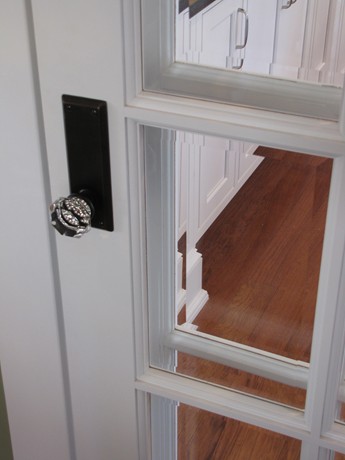 A close up of a crystal doorknob