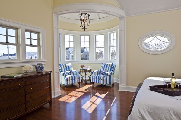 A bedroom with turret sitting room