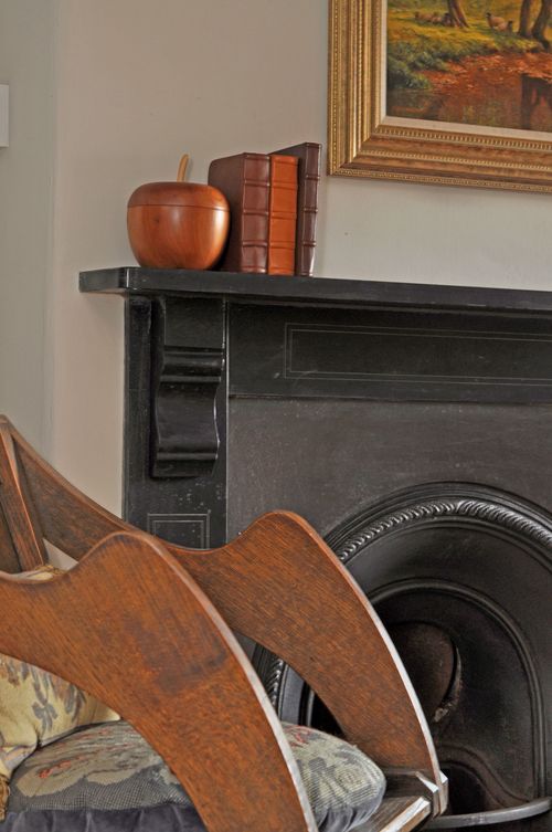 A chair sitting in front of a wooden table