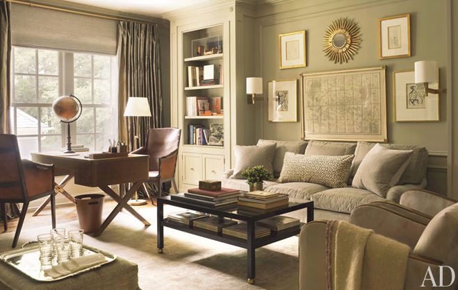 A living room filled with furniture and a large window