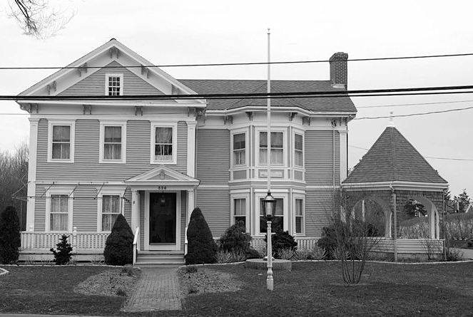 black and white photo of house before remodel