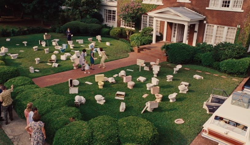 front yard of Hilly\'s house covered with old toilets