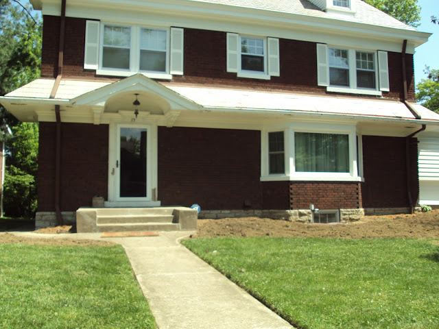 A large lawn in front of a house